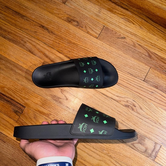 MCM Black Slides with Green Logo Pattern